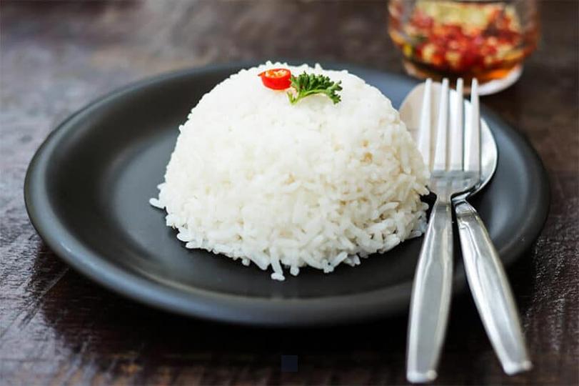Combien de cuillères de riz cuit obtenez-vous à partir de 150 g de riz cru?