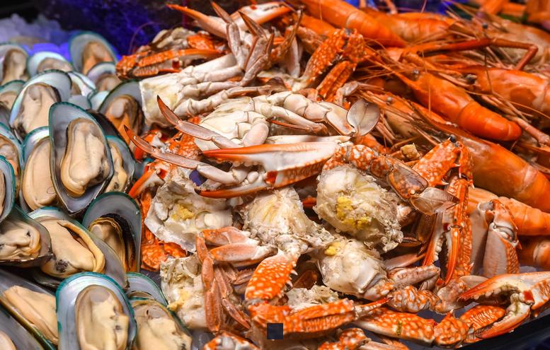 Combien de temps faut-il cuire les fruits de mer dans un bouillon de riz pour une perfection gustative absolue?